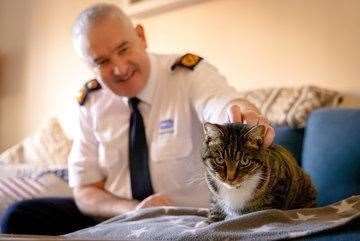 Dermot Murphy, RSPCA inspectorate commissioner pictured with a rescued cat.
