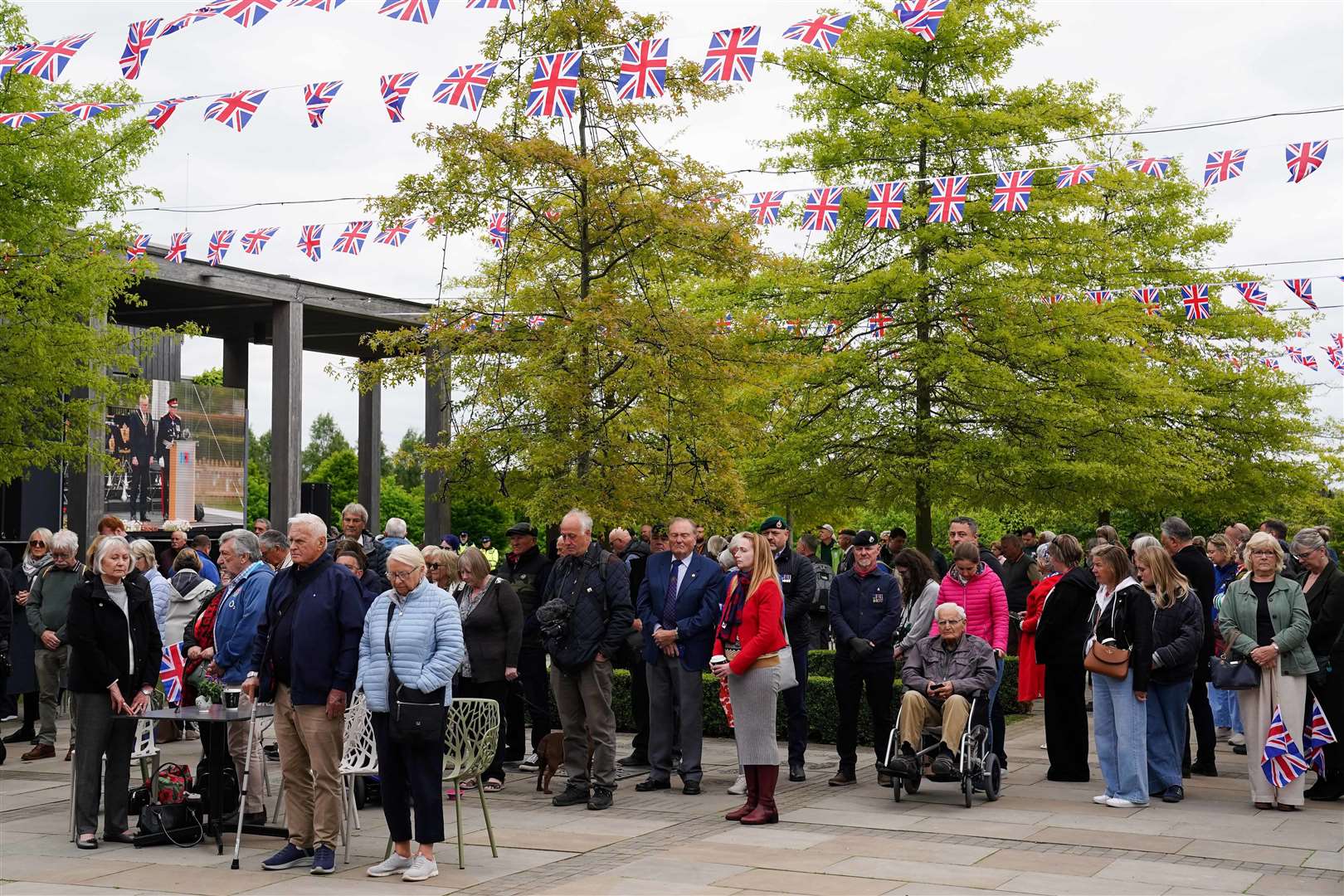 People stood to observe a nationwide two-minute silence across the country (Jacob King/PA)