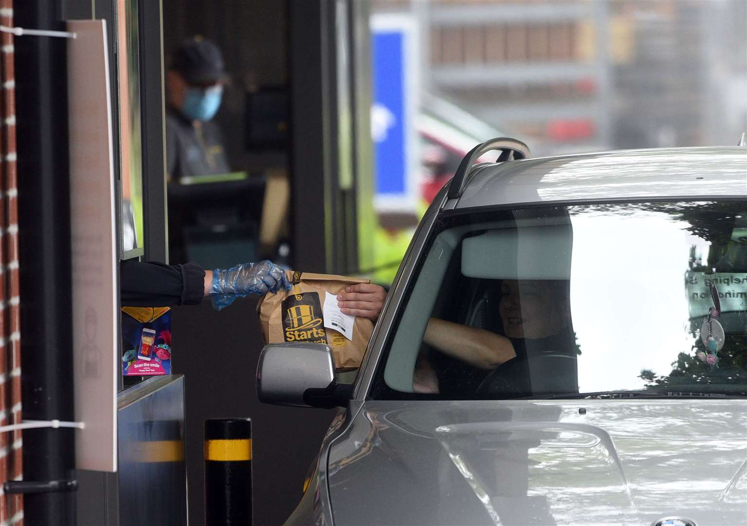 Delight as McDonald's lifts the shutters in Wisbech with a queue of up to 20 cars first thing.