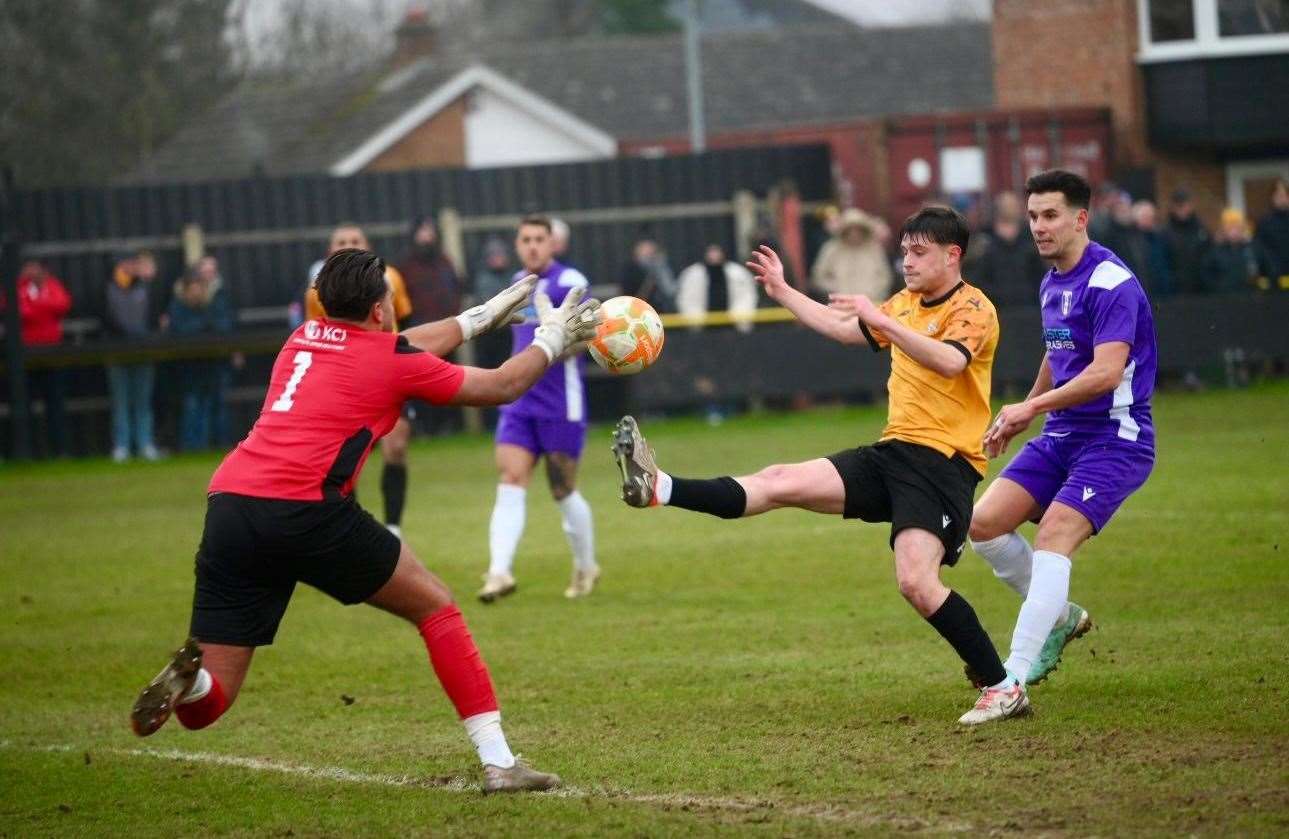 The Daventry keeper foils a March attack