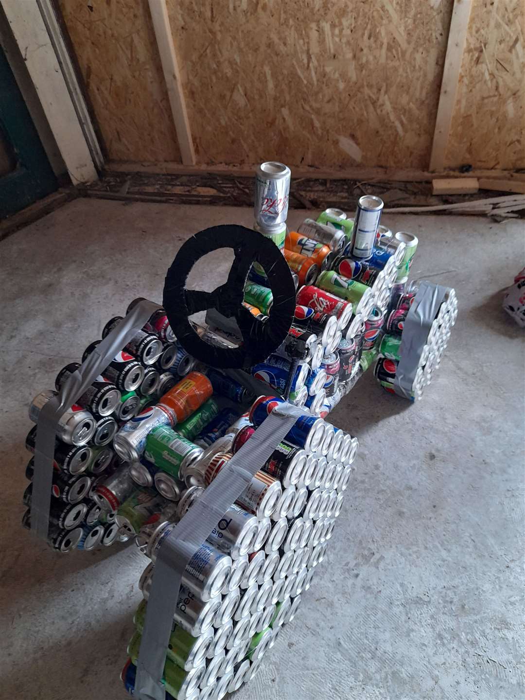 A work in progress - the tractor before it was spray painted. (47836576)