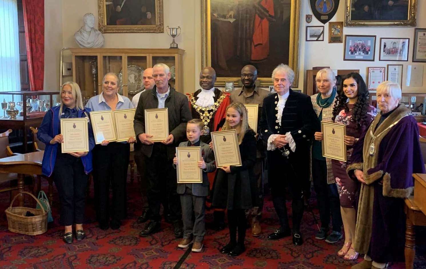 All the certificate winners proudly show off their awards after receiving them at the special ceremony