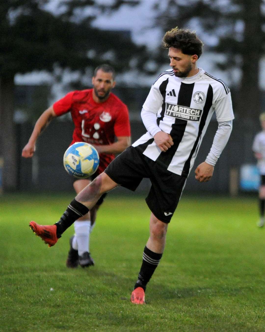 Action from the Spalding Inter-Services Cup final between Long Sutton and Tydd. Photo: Chris Lowndes