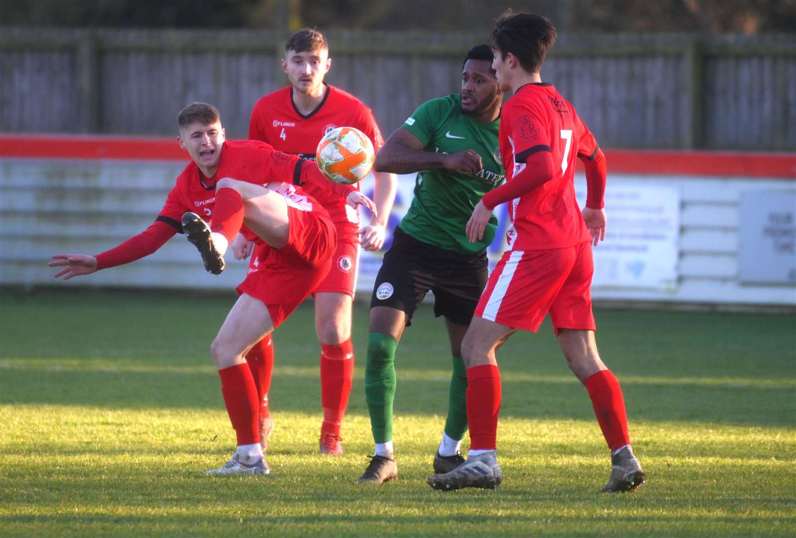 Owen Howard attempts a clearance