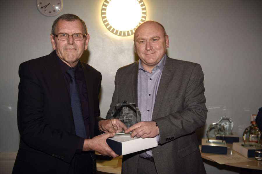 Wisbech's unsung heroes awards night at The Oasis Centre - Trevor Ketteringham receives his award from Councillor Andy Maul.