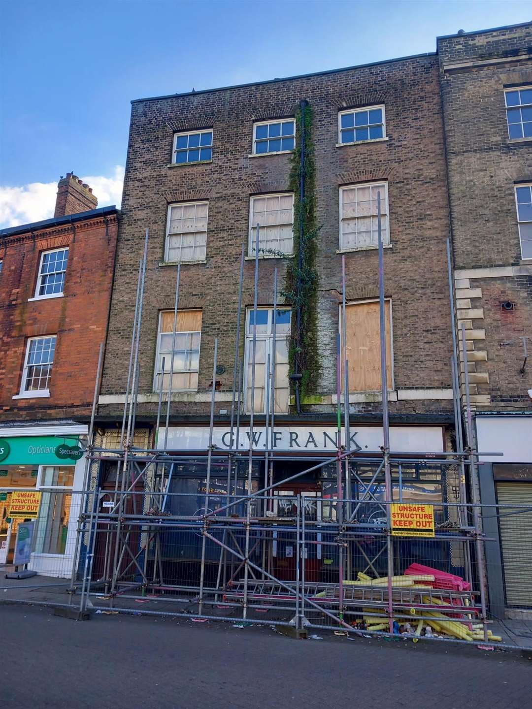 The owner of Grade II listed former Franks butchers in Wisbech Market Place has been ordered to complete improvements within two months.