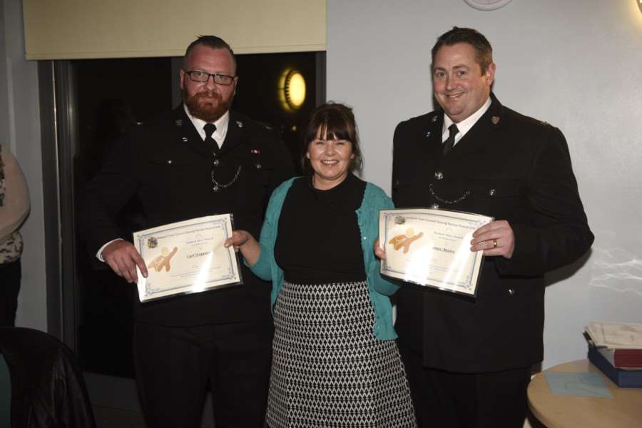 Wisbech's unsung heroes awards night at The Oasis Centre - police officers Carl Stoppard and Jasmes Moore runners-up in the Wisbech Hero award category with Sarah Cliss of the Fenland Citizen.