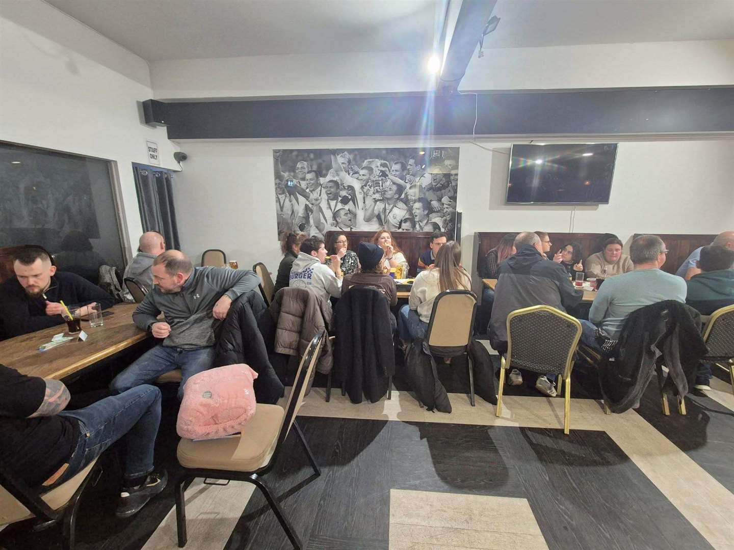 The quiz teams put their thinking caps on to find the answers to quizmaster Tommy's questions