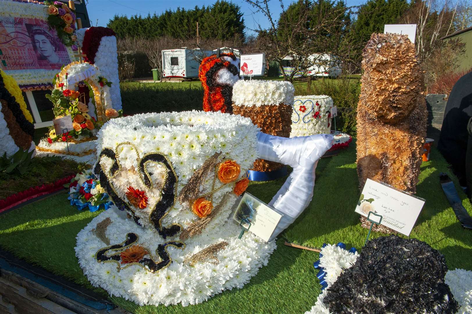 Colourful tributes at the graveside