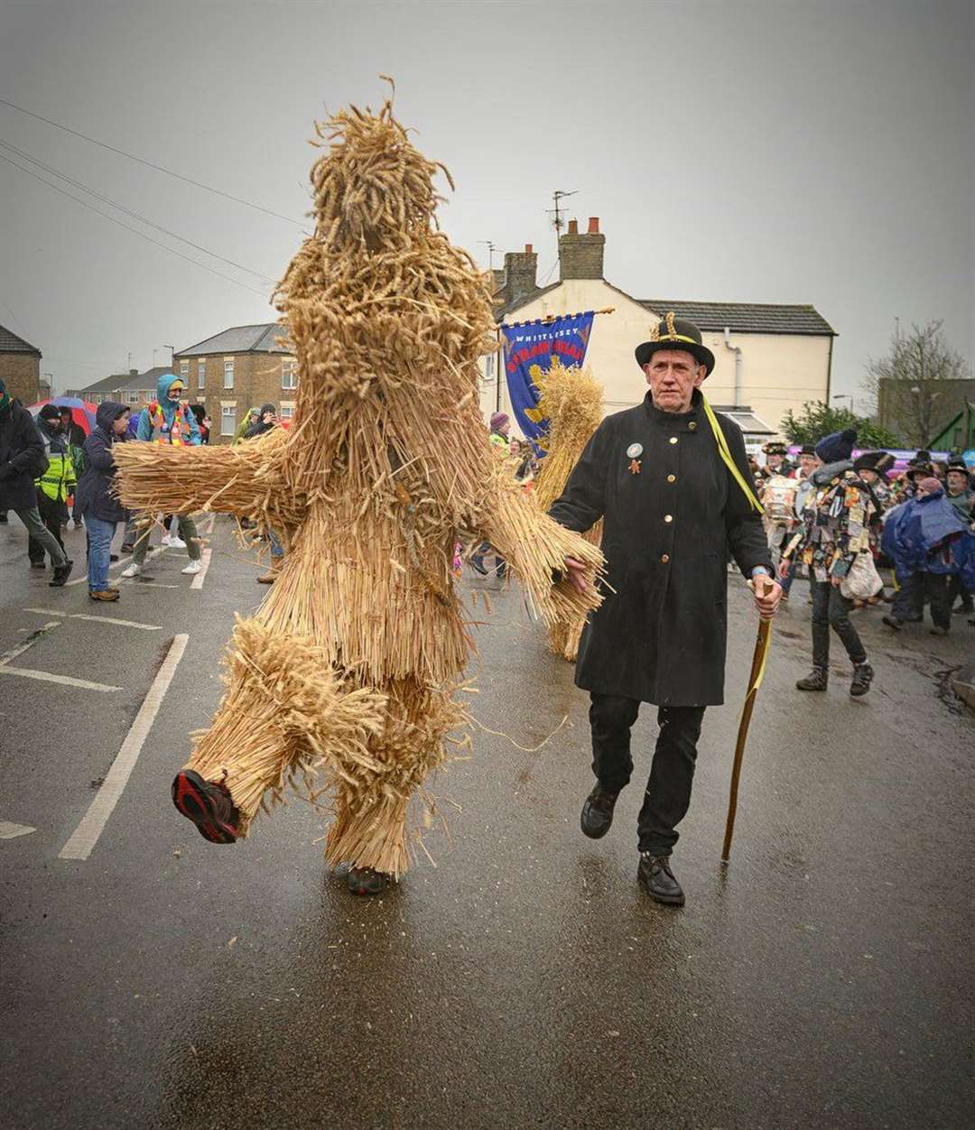 The Straw Bear is led on a procession through the town stopping at various venues along the way. Picture: Whittlesey Straw Bear Festival