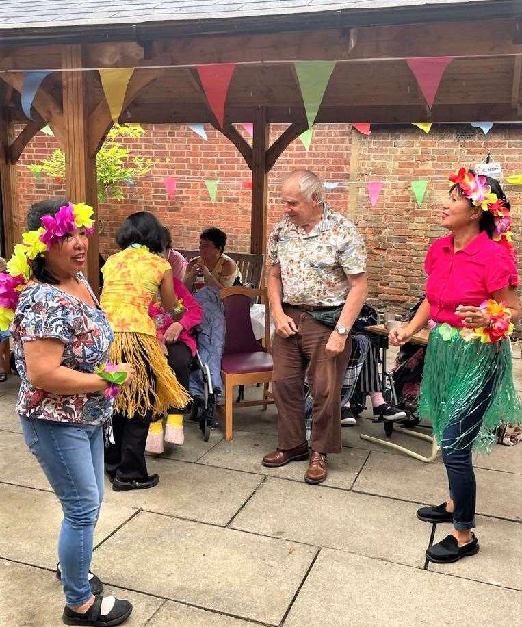 Residents and team members enjoying a dance.