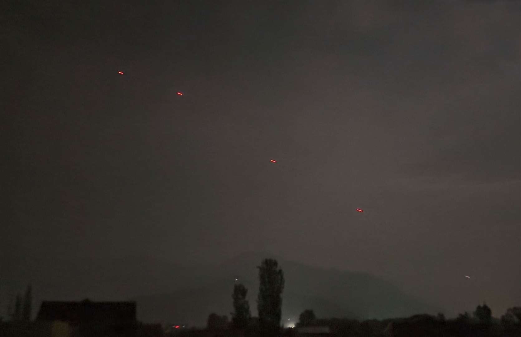 Red projectiles over Srinagar, in Indian controlled Kashmir, on Saturday (Mukhtar Khan/AP)