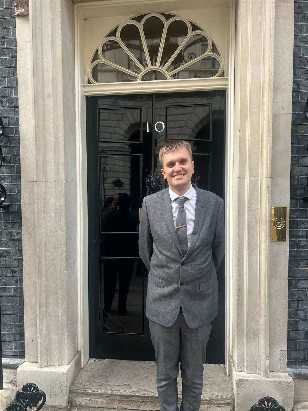 Jake Burton pictured outside No10 Downing Street following his invitation to a special reception and (above left) on the cricket field.