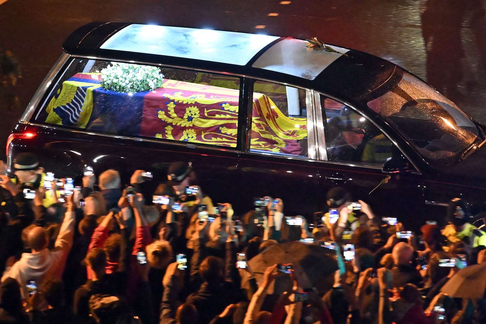 With lights and large windows, the hearse was specially designed and approved by the Queen. Image: PA.