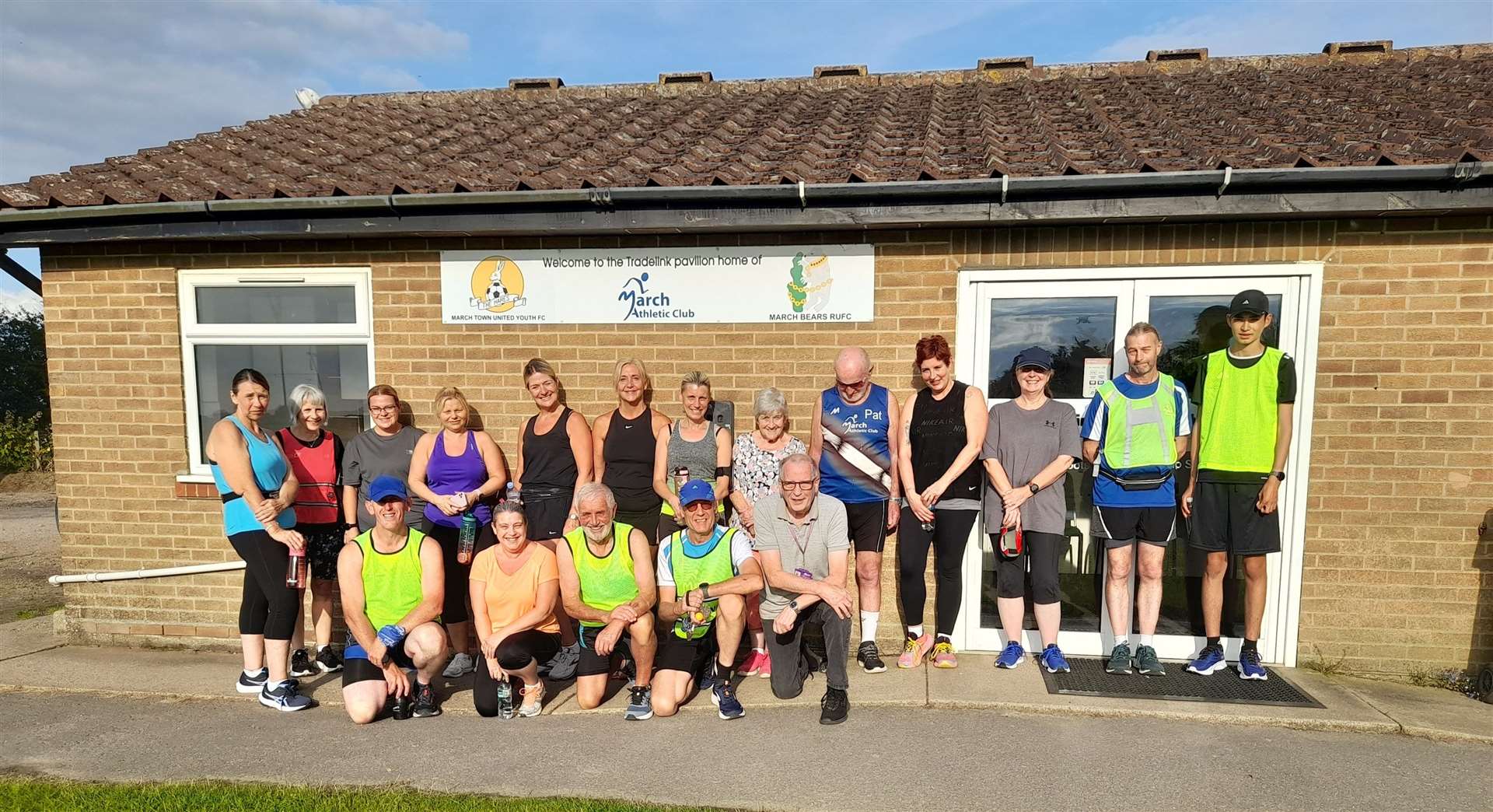 Couch to 5k 'graduates' in March with, front right, Fenland District Council portfolio holder for leisure Cllr Alex Miscandlon, volunteers from March Athletic Club, and the run leader.