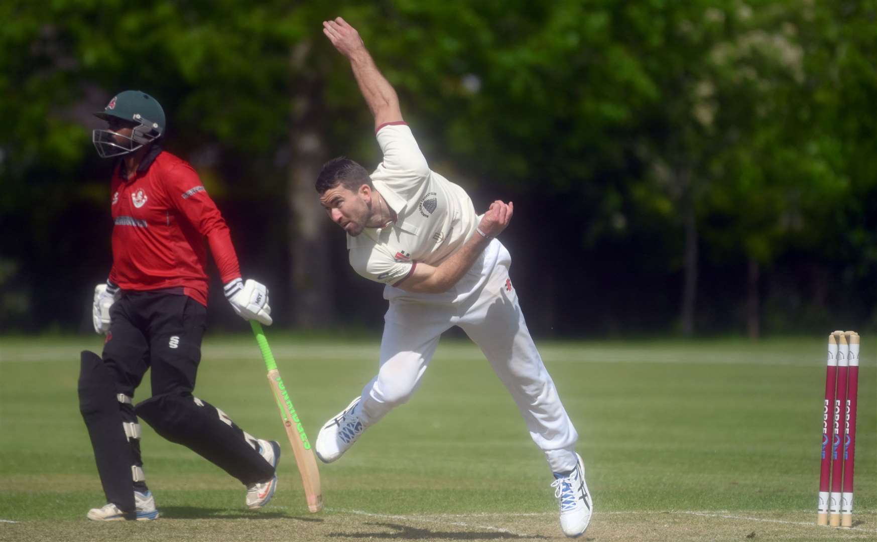 Josh Fisher took a wicket for March and then top scored with 23