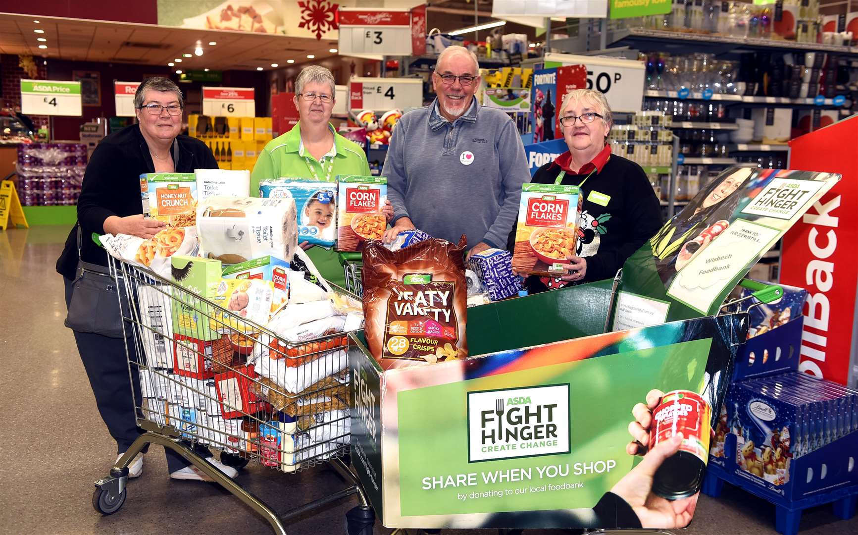 Representatives from Wisbech food bank at Asda with donations that have been made....left to right Margaret Gibbs, Theresa Dare, Trevor Wright and Sue Kerridge. (5728860)