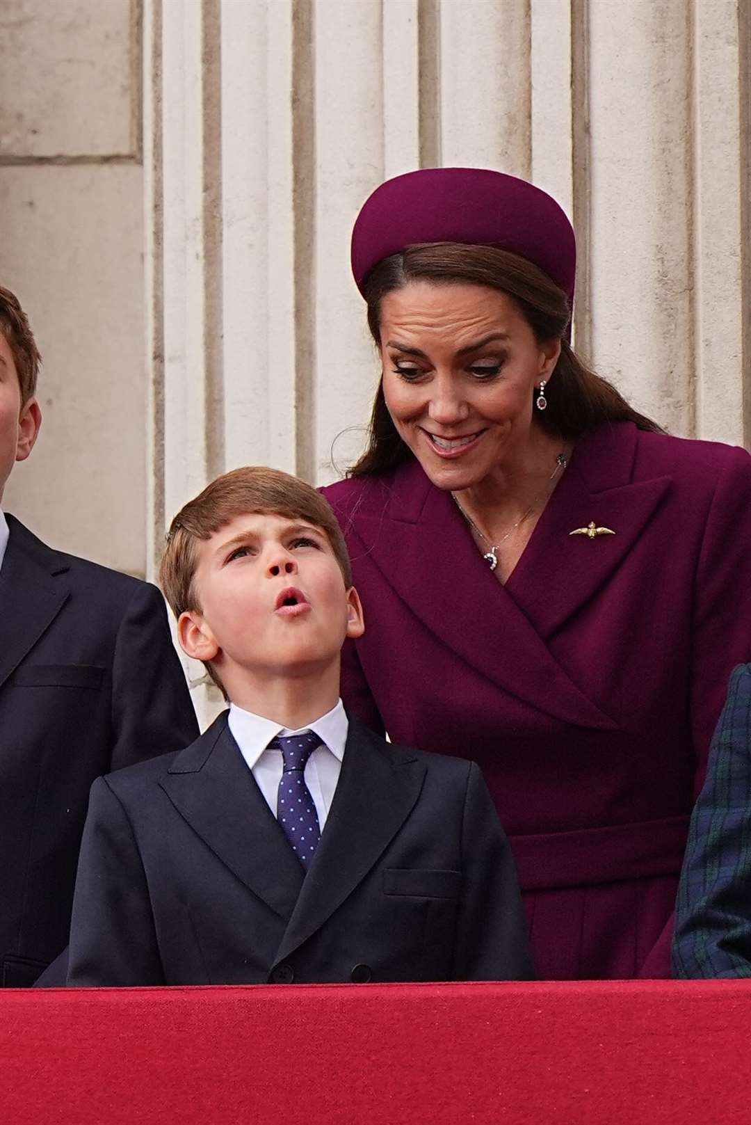 Louis’s reaction to the flypast seemed to amuse Kate (Aaron Chown/PA)