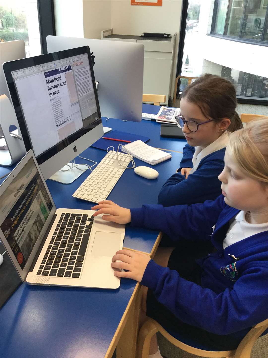 Pupils used what they learnt during the visit to write their own articles. (26824188)