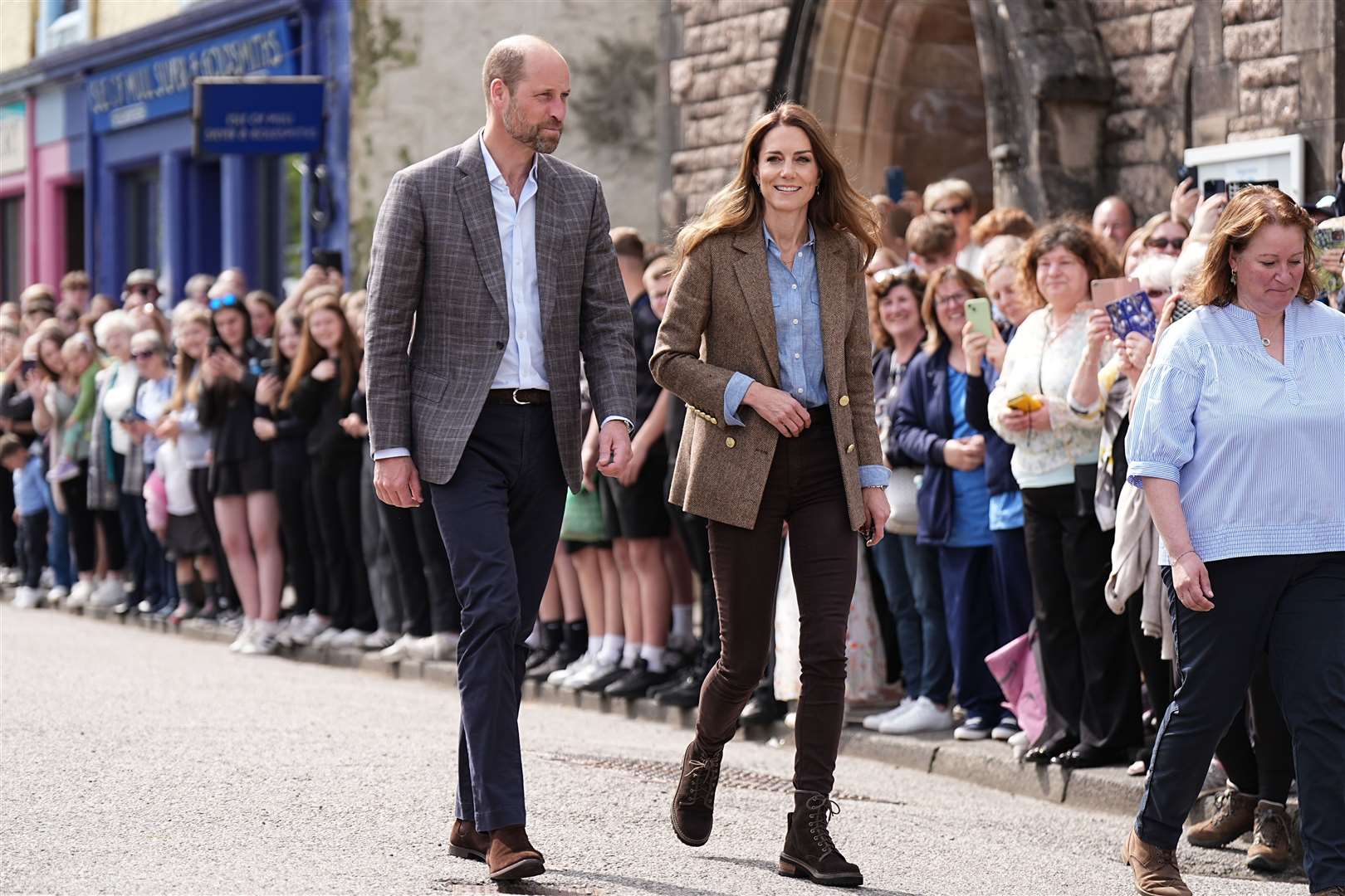 Crowds lined the streets as the Prince and Princess of Wales, known as the Duke and Duchess of Rothesay when in Scotland, visited the town of Tobermory on the Isle of Mull (Aaron Chown/PA)