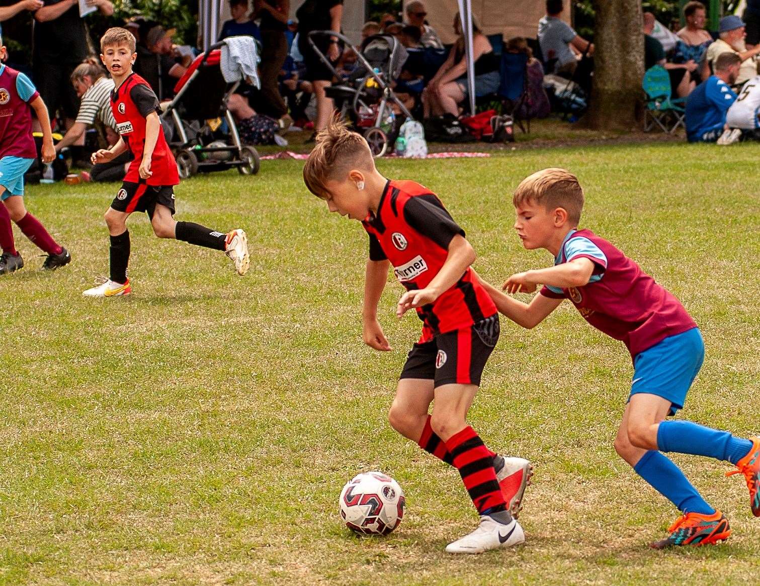 Action from the annual Wisbech St Mary football tournament.