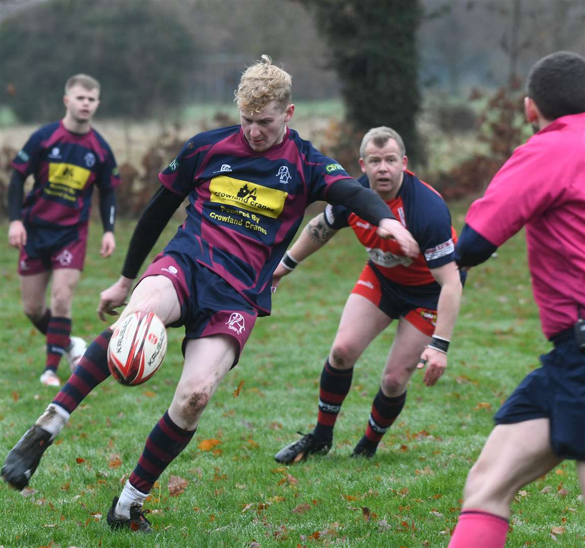 Wisbech v Spalding rugby action. (53807104)