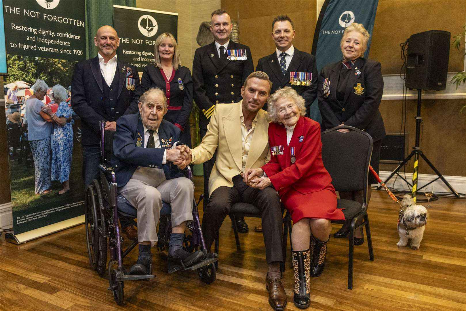 Veterans and serving military with Matt Goss (Schmooly/The Not Forgotten/PA)