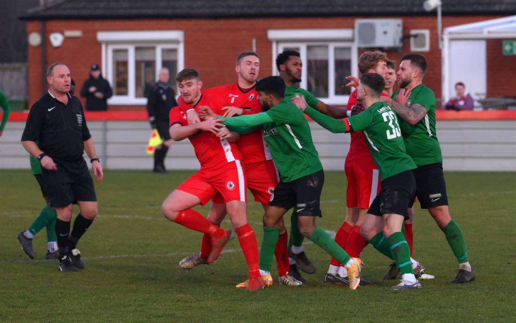 Referee Mark Simmons got Max Mattless (far left) and Kegan Everington (left) confused when sending Mattless off