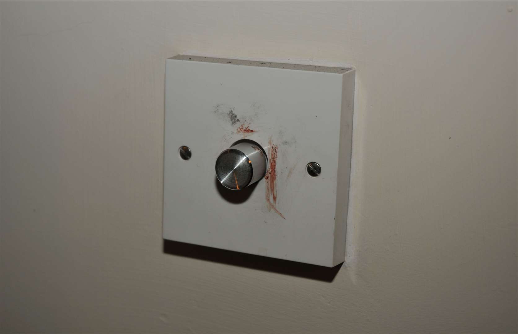 Blood was found on one of the lightswitches on Una Crown’s home