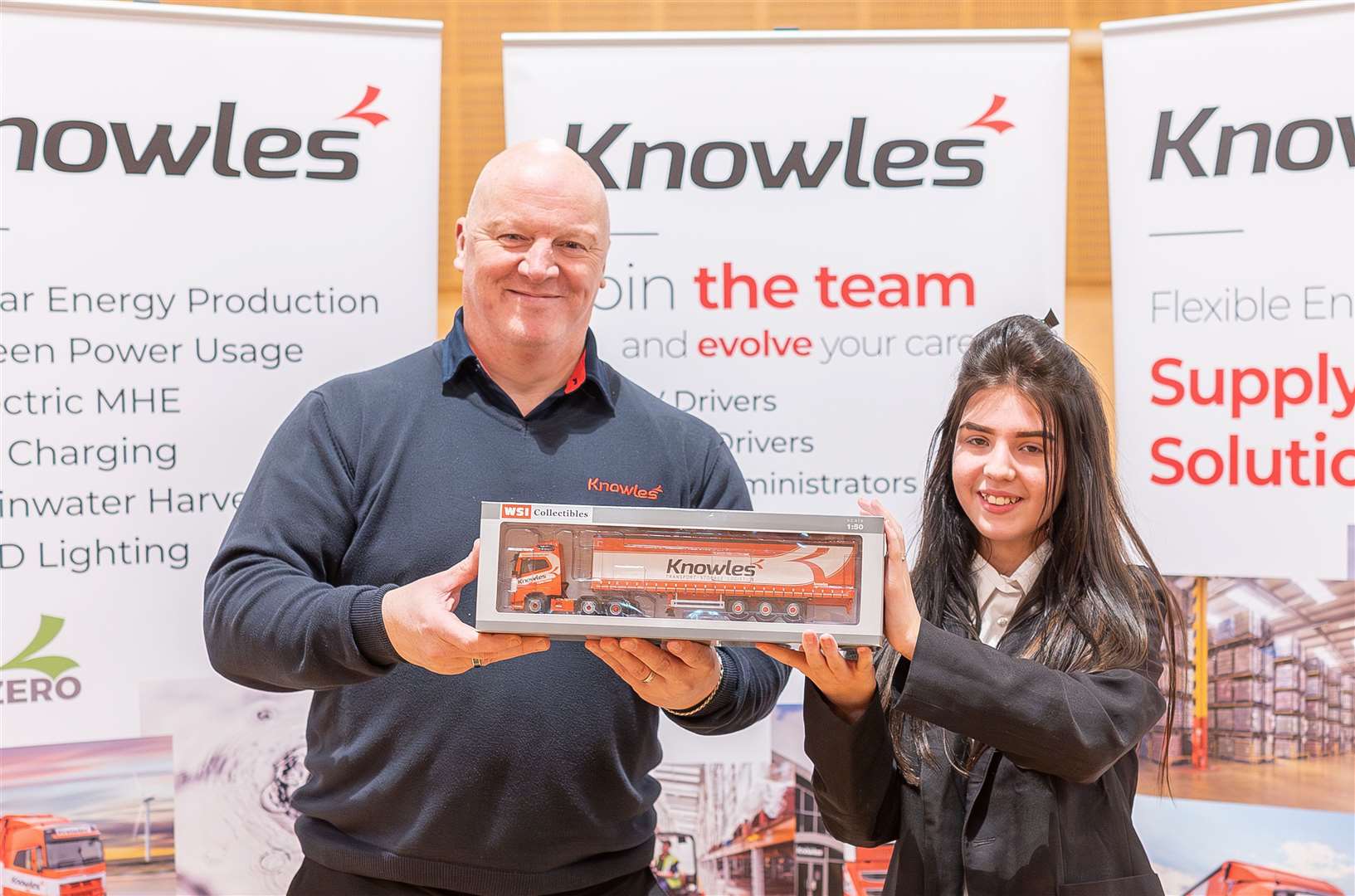 Dean Hill from Knowles Transport presents a model lorry. Picture credit: Ian Burt/Barking Dog Media