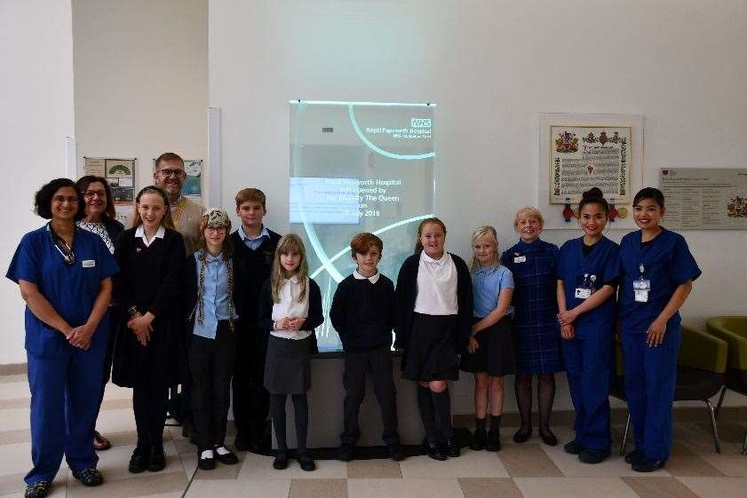 Staff and pupils from Tydd St Mary Primary School met Dr Denise Braganza (far left), Chief Executive Eilish Midlane (third from right) and nurses from our catheter laboratory team (far right)