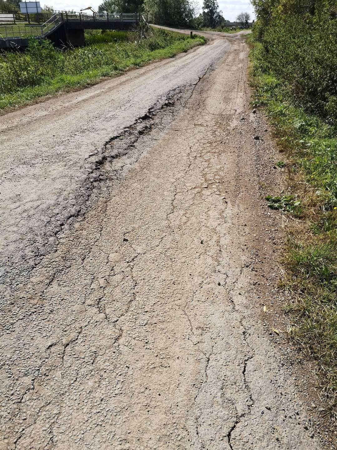 Heavy lorries have caused major damage to a minor village road. (16207176)