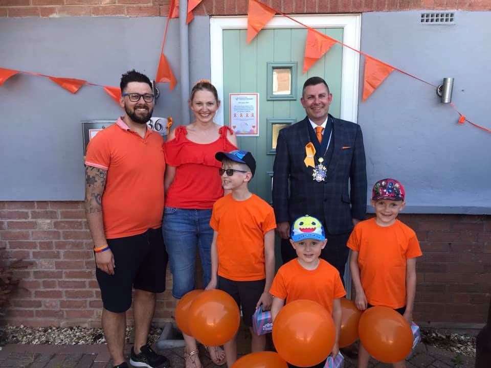 Ben and Sarah Dodkin and their boys, Finley, Arthur and Harrison with mayor Andrew Lynn.