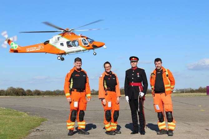 Magpas Air Ambulance CEO, Daryl Brown MBE DL, with the Magpas medical team and air ambulance. (55547599)
