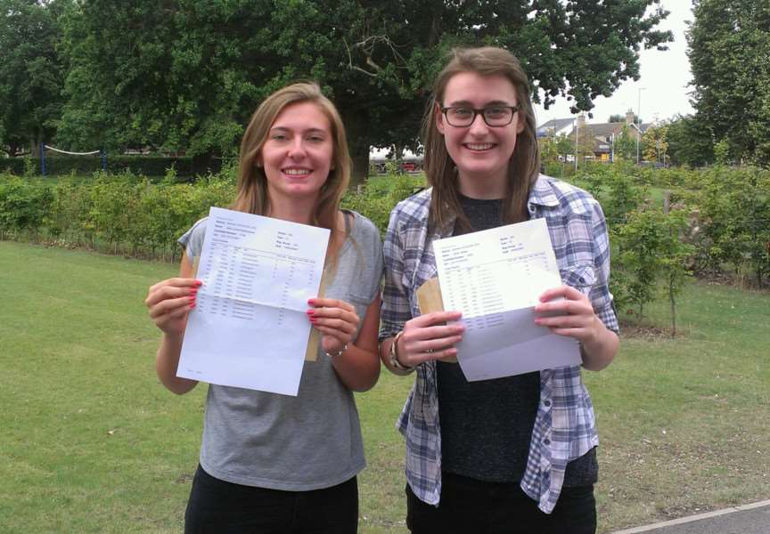 Students Jade Ketteringham (left) and Isobel Mawby pick up their A Level results from the Neale Wade Academy in March.