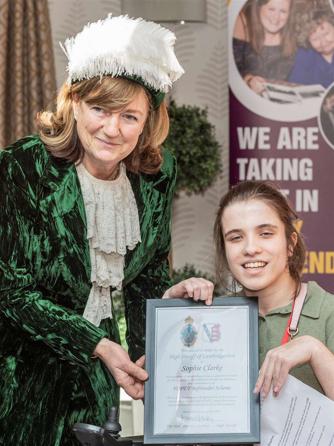 The High Sheriff of Cambridgeshire presents the certificate to Sophie