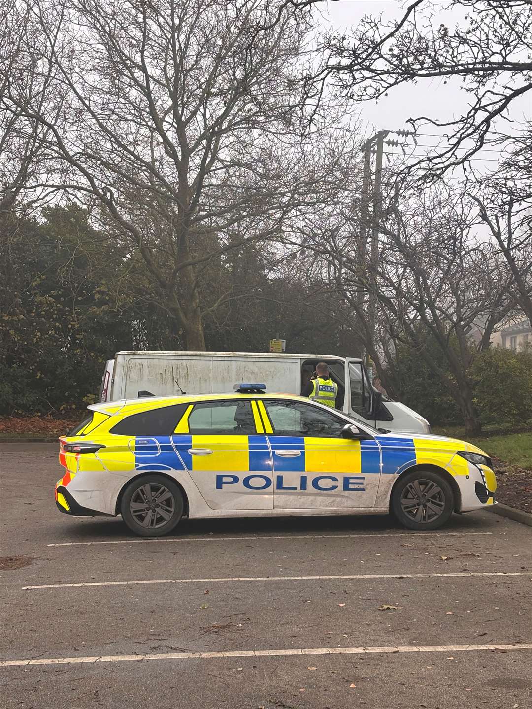 Officers speak to one of the drivers they pulled over. Picture: Cambridgeshire Police