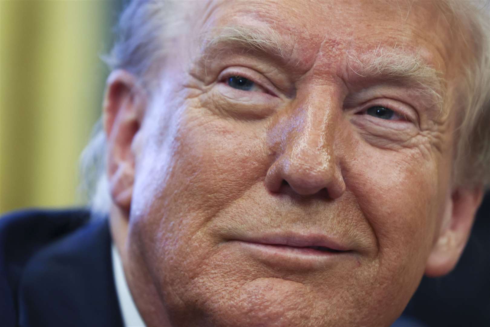 President Donald Trump in the Oval Office at the White House in Washington (Pool via AP)