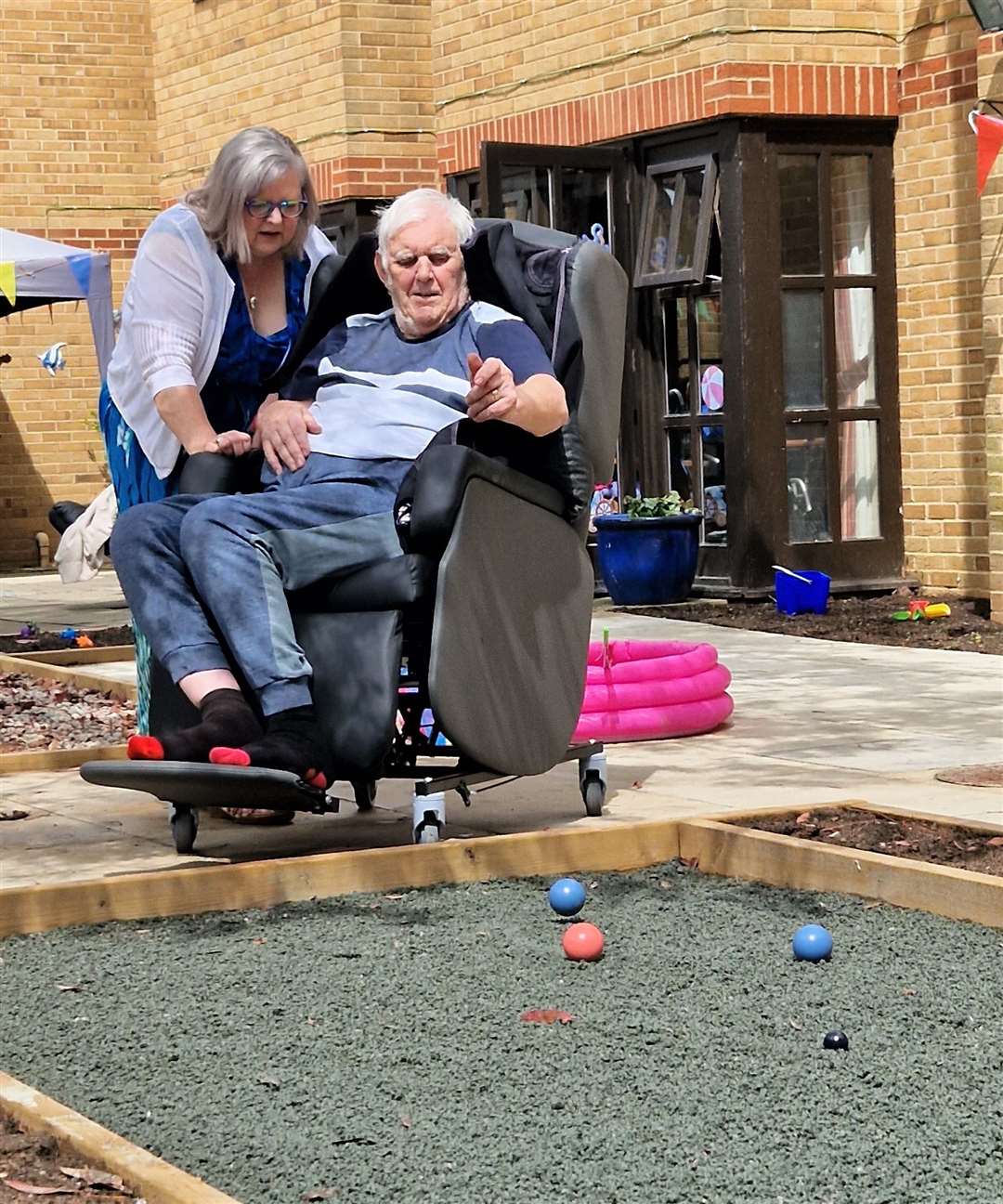 Home manager Anne Hillary and resident Chris Reinhartz enjoying a game of Petanque.
