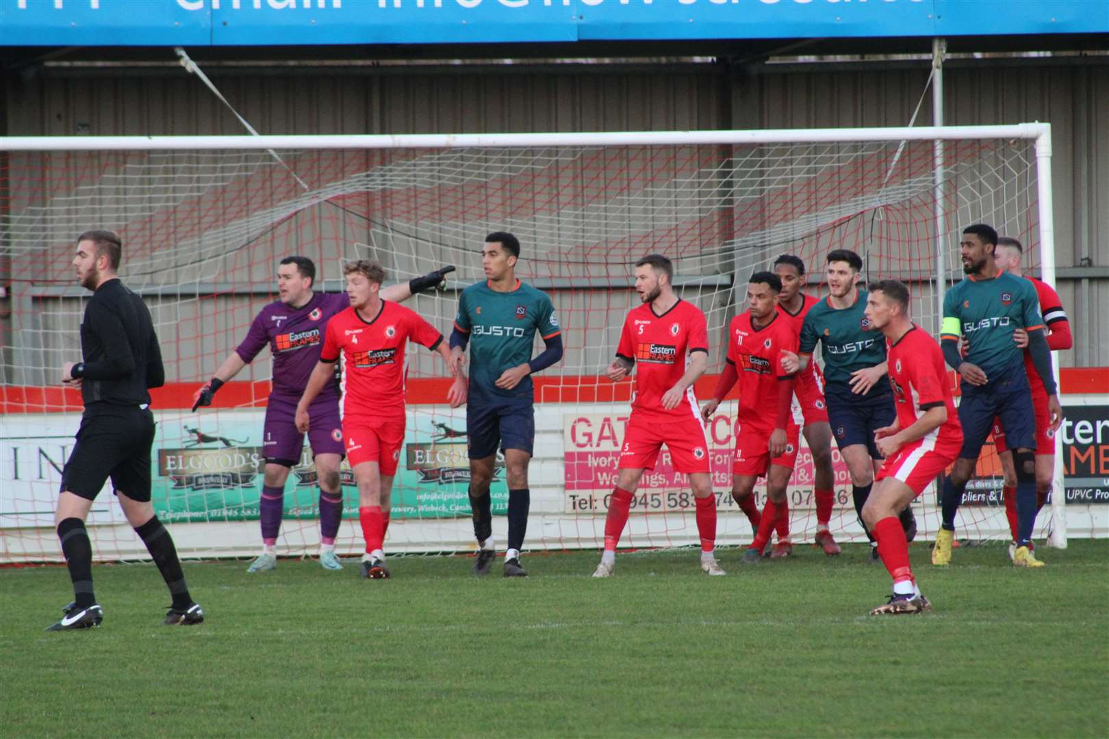 Action from today's game between Wisbech Town and Newark & Sherwood. Photo: ERIN LARHAM