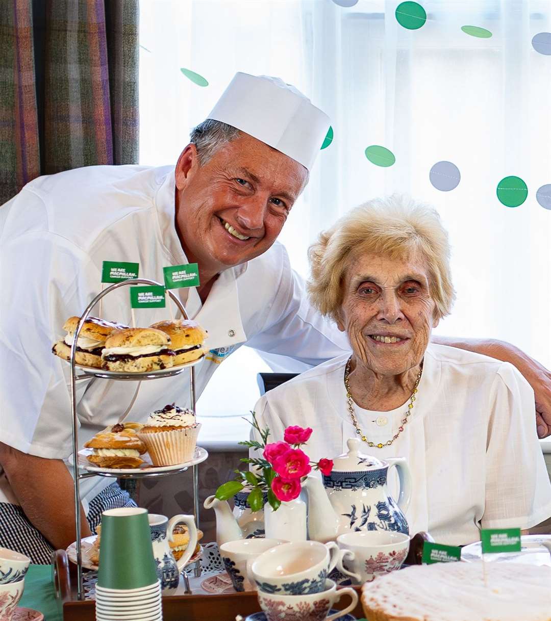 FC Chef Wayne Woolman and resident Joyce Wardle have been busy baking for Macmillan