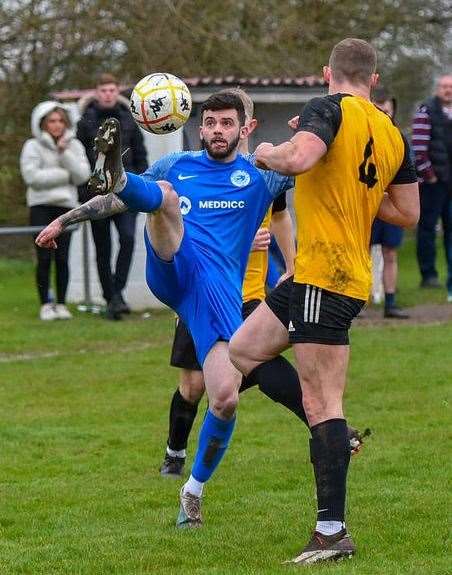 Action from the game between Outwell Swifts (blue) and March Town A (black and amber). Picture: Andrew Lister