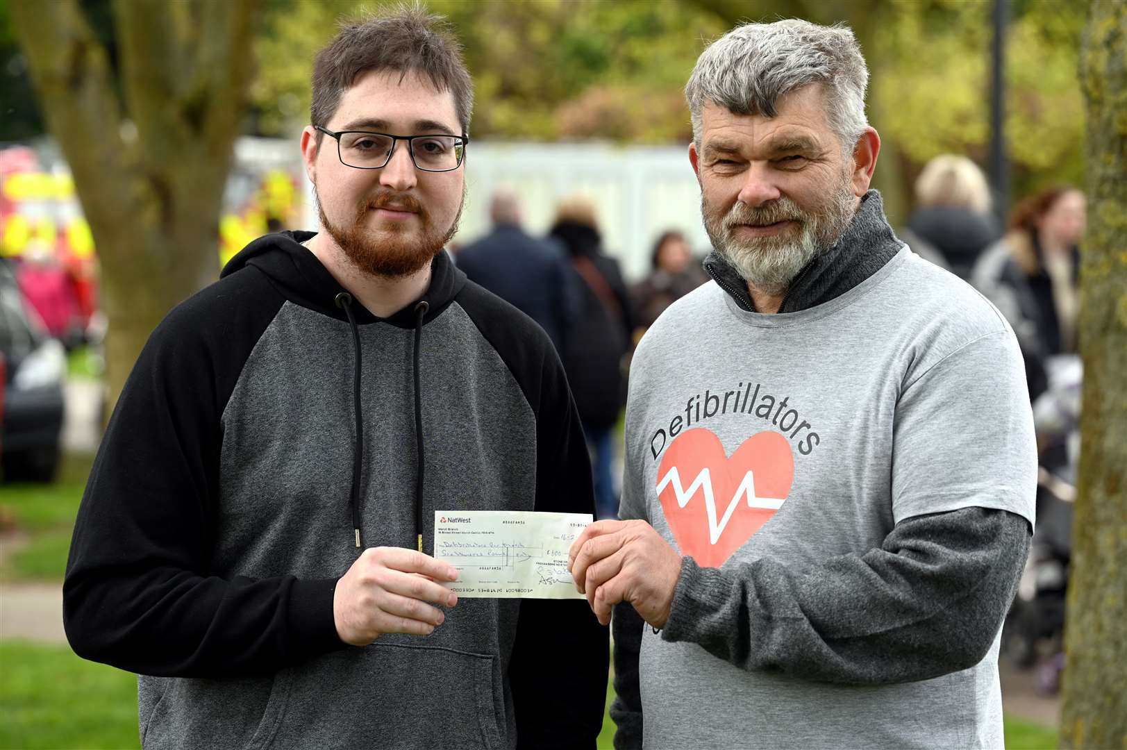 From left Clinton Elkin from Stonecross Freemasons March and Rob Skoulding for defibrillators