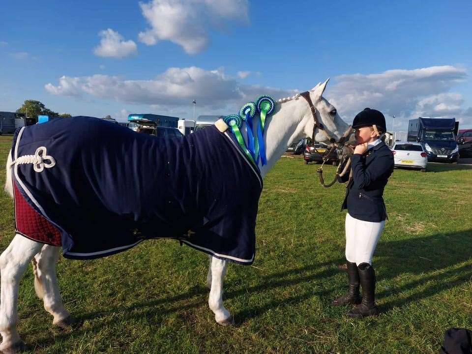 Showing off their rosettes