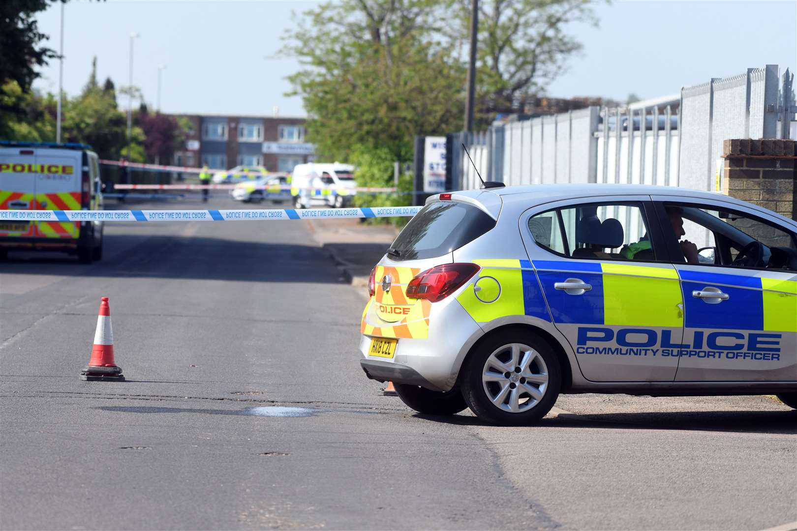 Police at the scene of the alleged murder in Sandall Road, Wisbech.