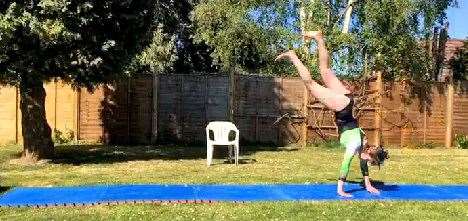 Erin Pattinson does gymnastics inspired by Olga Korbet. (34695765)