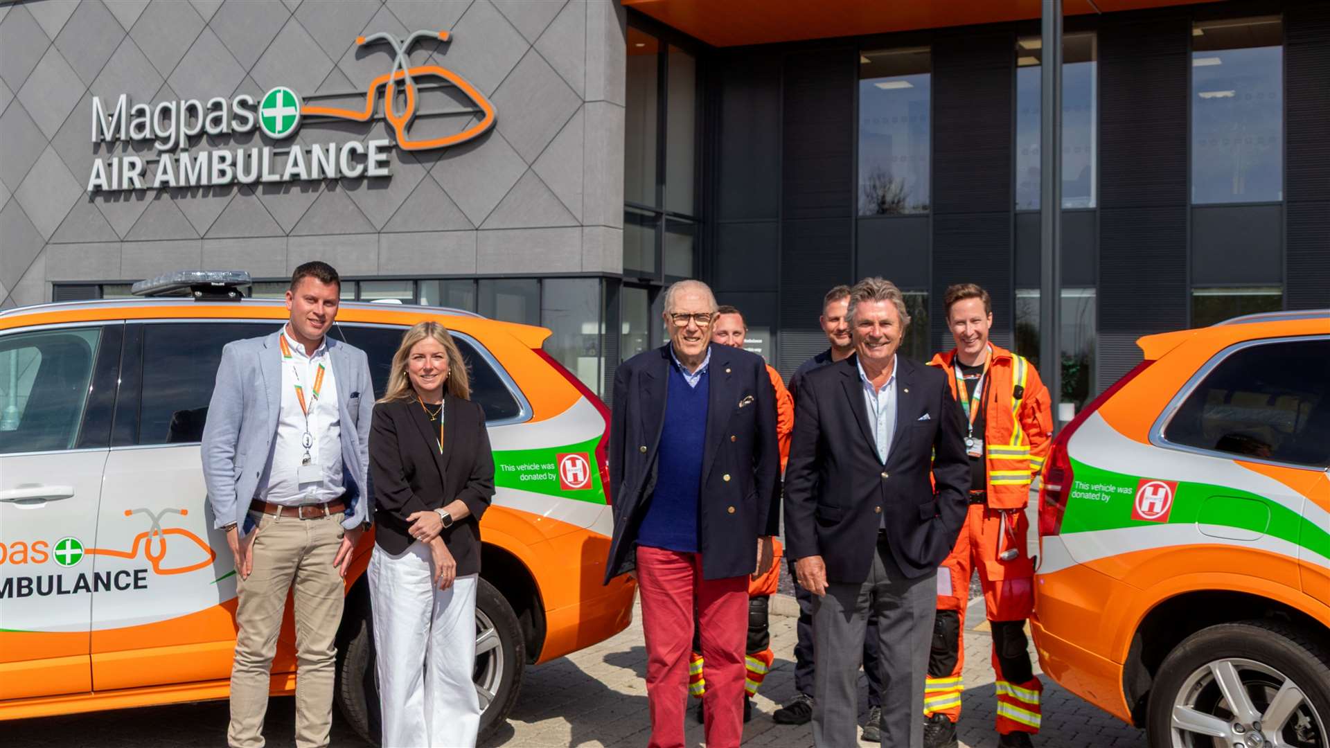 HELP Appeal visited Magpas Air Ambulance - Magpas Air Ambulance CEO Daryl Brown MBE DL and director of income and engagement Lucy Chapman, HELP Appeal's chairman Michael Henriques and chief executive Robert Bertram, with the Magpas Air Ambulance team behind