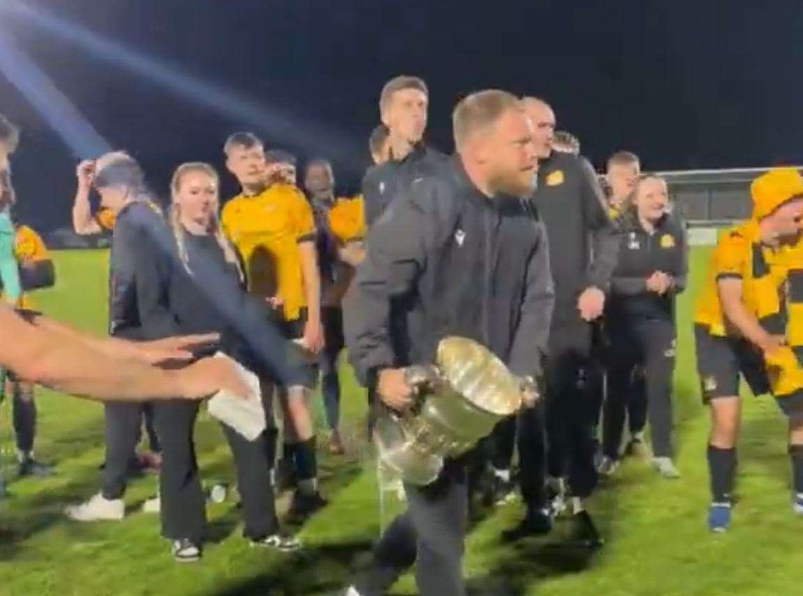 March Town manager Ash Taylor with the cup.