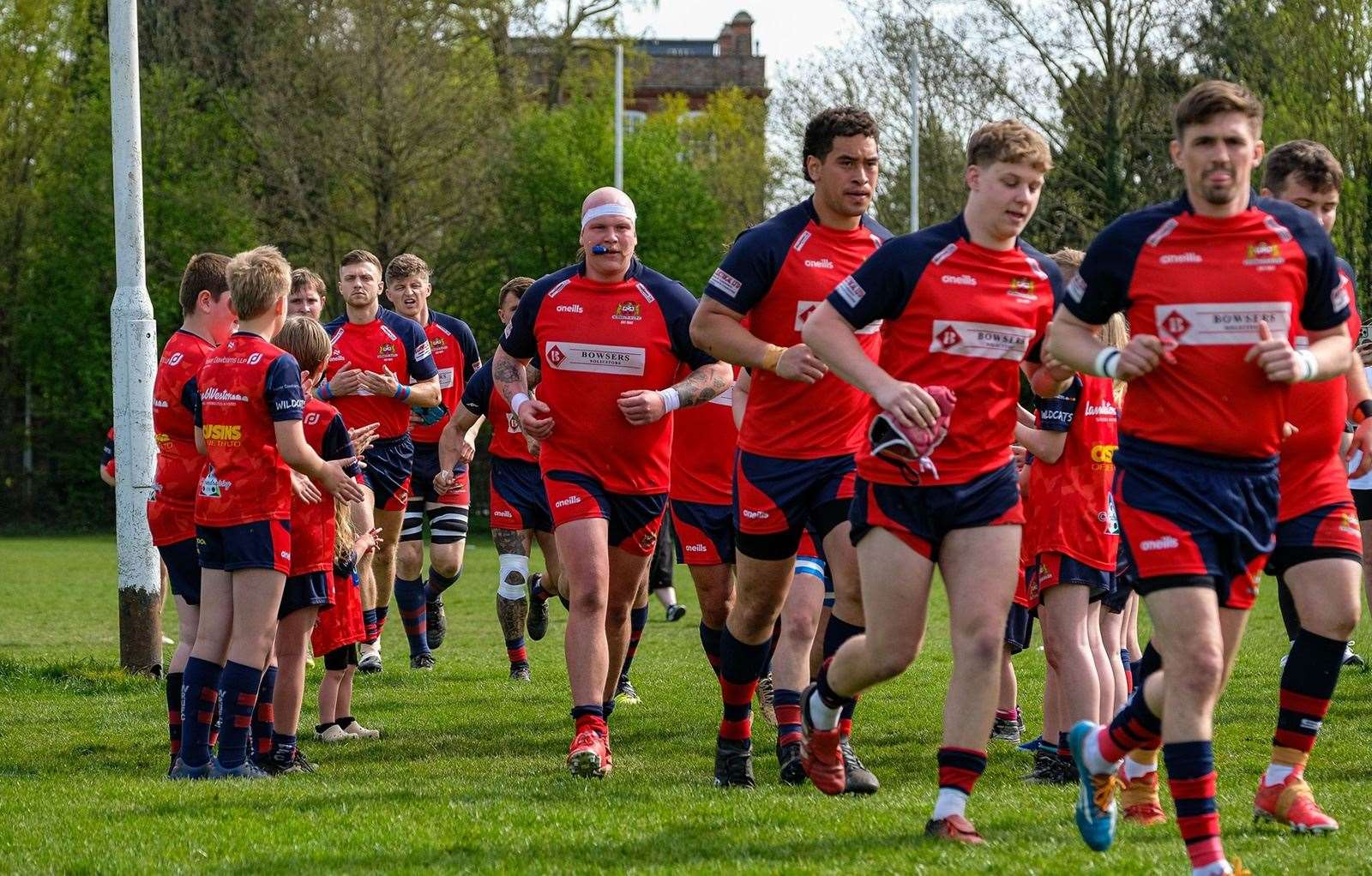 Wisbech mini players formed a tunnel, clapping both teams onto the pitch. Picture: Andy Titmuss