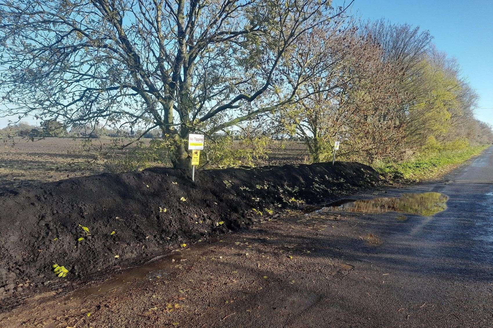 The site has been cleared and a soil and concrete bund put in place to deter fly-tippers.